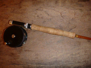 An 8 1/2-foot  Phillipson Paragon from the late 1940s and a Thompson 100 reel, made in San Francisco.