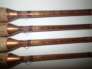 A lineup of Phillipson Peerless rods with their distinctive "nosecone" winding checks. The Peerlesses were impregnated with a resin that helped protect the cane from  moisture.  The Phillipson company, located in Denver, was owned by Bill Phillipson, the former head of rodmaking at Granger and one of the most influential rodmakers of the mid-20th century.